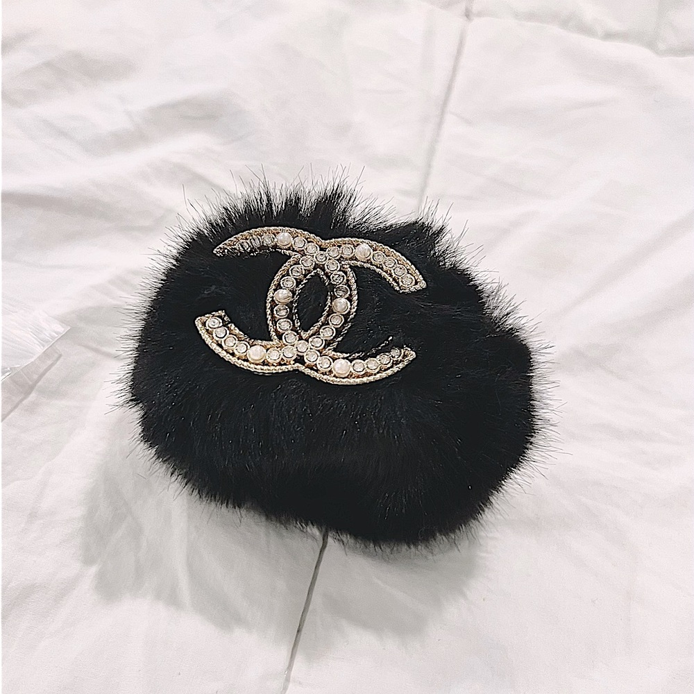 SOLD Black fur Bracelet with center rhinestone design.